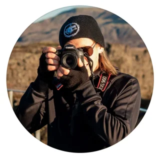 Vind Vargasong holding a camera to his eye